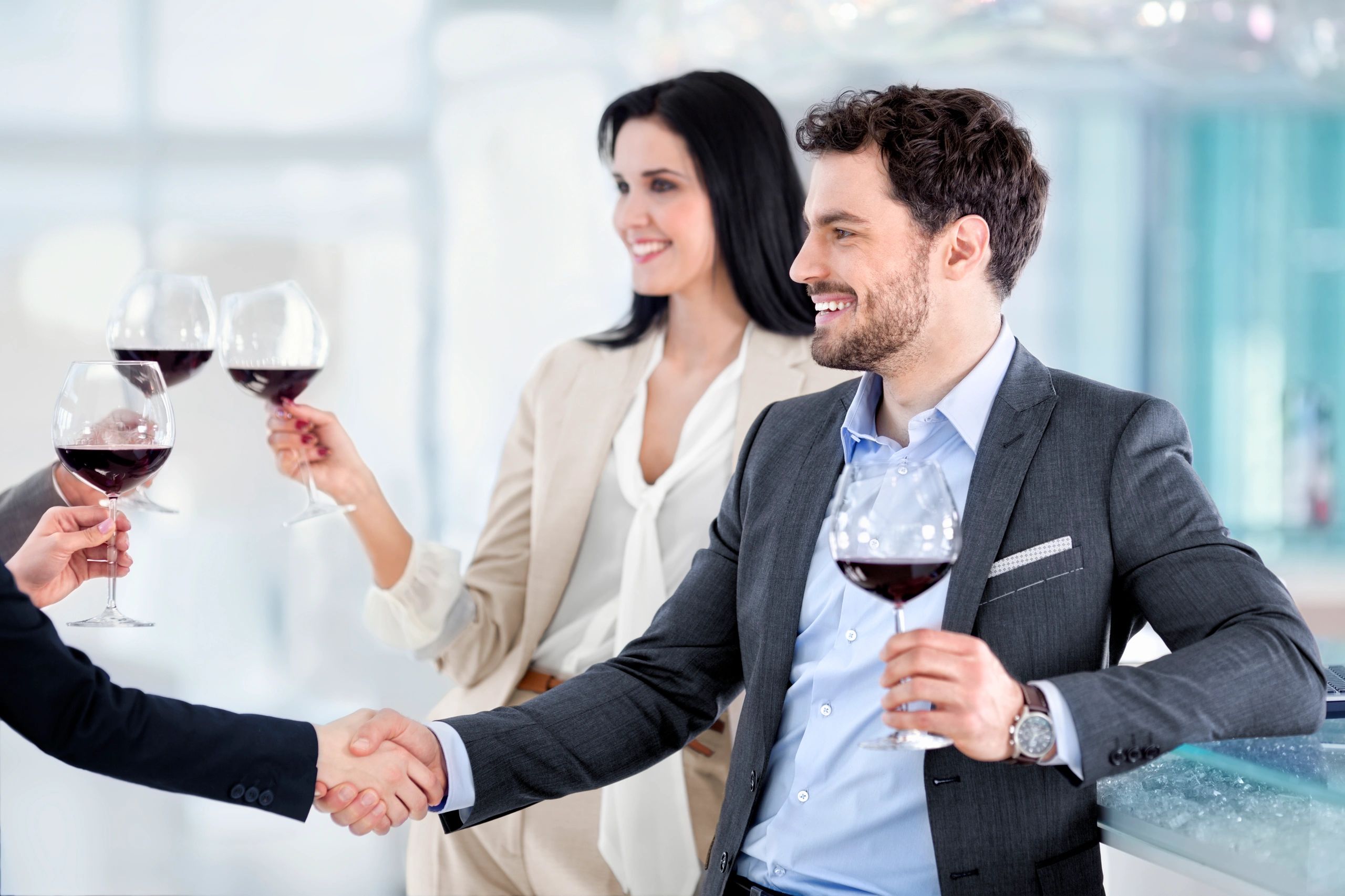 business handshake wine